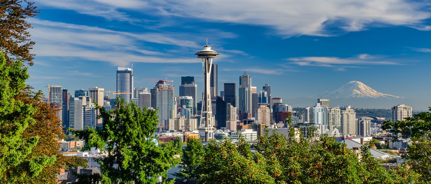 A photograph of downtown Seattle Washington with Mt. Rainier in the background.